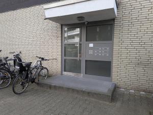 two bikes parked in front of a brick building at Monteur Atelier in Marl