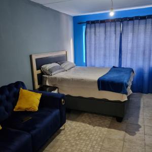 Letto o letti in una camera di Greggs Place at Capital Hill Arcadia