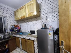 Kuchyň nebo kuchyňský kout v ubytování Cozy Bay