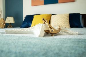A bed or beds in a room at Casa Derosa in Sorrento Centro