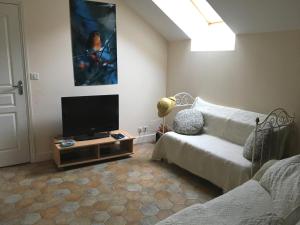 Et opholdsområde på Charmante ferme vue exceptionnelle 10 voyageurs