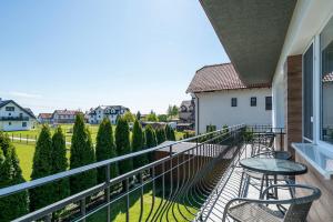 Balkón nebo terasa v ubytování PIONOW Pokoje WaWa - adults only