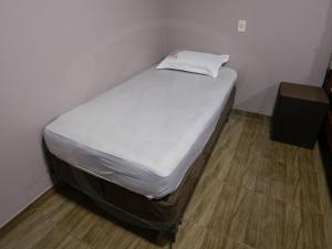 Voodi või voodid majutusasutuse Yguazú Resort toas