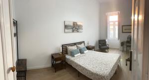Postel nebo postele na pokoji v ubytování Yellow Guesthouse + 5 fotografií