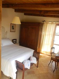 Postel nebo postele na pokoji v ubytování Monte Atena B&B di Charme