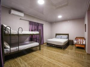 Voodi või voodid majutusasutuse Yguazú Resort toas