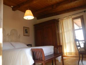 Postel nebo postele na pokoji v ubytování Monte Atena B&B di Charme