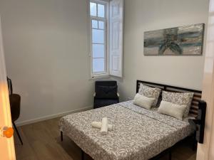 Postel nebo postele na pokoji v ubytování Yellow Guesthouse