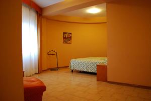 Letto o letti in una camera di Hotel Tre Torri