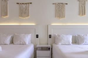 Postel nebo postele na pokoji v ubytování MERAKII SEAVIEW ESCAPE CURACAO