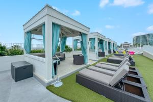 a rendering of a rooftop deck with a gazebo at Caribe D-0404 in Orange Beach +41 photos