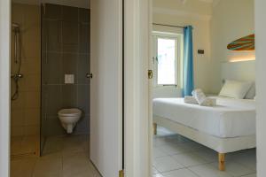 Ein Badezimmer in der Unterkunft MERAKII SEAVIEW ESCAPE CURACAO