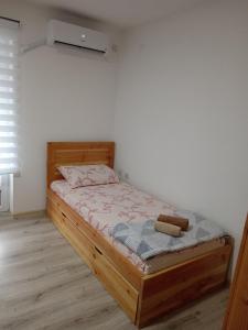 Postel nebo postele na pokoji v ubytování Apartman N&N