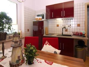 Kuchyň nebo kuchyňský kout v ubytování Ferienwohnung, Vogelsang-Warsin