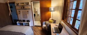 Letto o letti in una camera di Pousada Chalé Poder das Pedras