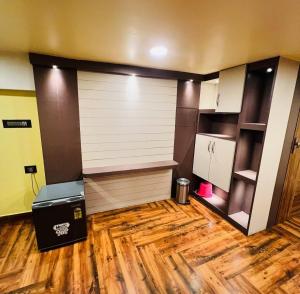 Kuchyň nebo kuchyňský kout v ubytování Urbanstays By Saksham