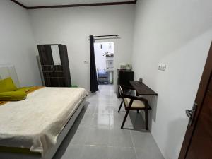 Ένα ή περισσότερα κρεβάτια σε δωμάτιο στο Park side nest studio room 1