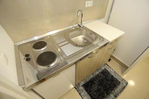 Kuchnia lub aneks kuchenny w obiekcie Central Square Guest House