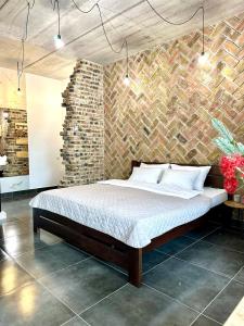 Ένα ή περισσότερα κρεβάτια σε δωμάτιο στο Comfortable apartments with a coffee machine in the city centre, Zlata Plaza