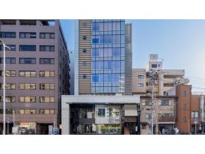 a group of tall buildings in a city at The OneFive Sendai - Vacation STAY 35241v in Sendai