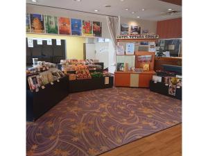 a store with a carpeted floor in a store at Hotel Tetora Resort Tsuruoka - Vacation STAY 39394v in Tsuruoka