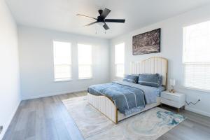 Ένα ή περισσότερα κρεβάτια σε δωμάτιο στο Luxurious 3BR Heartfelt Space in Dallas