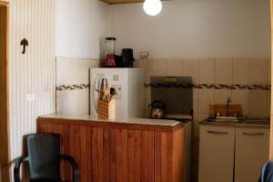 Kuchyň nebo kuchyňský kout v ubytování Cabañas en Dichato frente a la playa