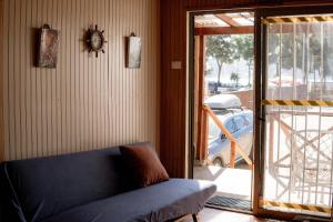 Posezení v ubytování Cabañas en Dichato frente a la playa + 4 fotografie