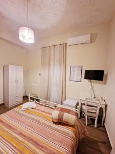 Postel nebo postele na pokoji v ubytování B&B Elisa