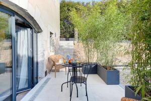 Zahrada ubytování L'Inséparable - Jacuzzi - Terrasse - Parking - Vélos