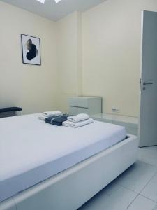 Postel nebo postele na pokoji v ubytování First Line Villa