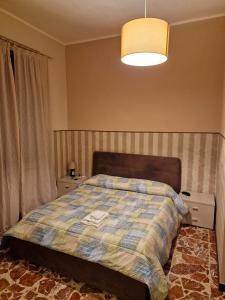 Postel nebo postele na pokoji v ubytování B&B Elisa