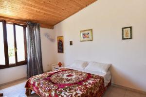 Posteľ alebo postele v izbe v ubytovaní Su Cuile historical country house with barbecue