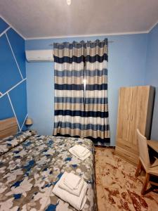Postel nebo postele na pokoji v ubytování B&B Elisa