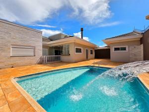 Foto de 5 Quartos 4 Banheiros, na Vila A, a 5 min Paraguai