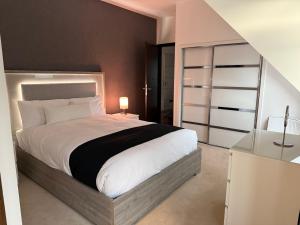 Katil atau katil-katil dalam bilik di Castlefield Penthouse