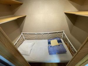 Postel nebo postele na pokoji v ubytování Logement 1 à 5 personnes