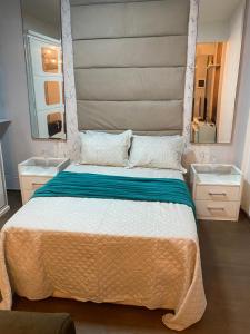 Ένα ή περισσότερα κρεβάτια σε δωμάτιο στο Sala e quarto próx ao Maracanã e Engenhão +8 φωτογραφίες