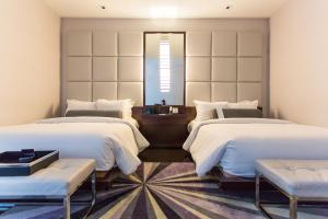 Lova arba lovos apgyvendinimo įstaigoje Ivy Boutique Hotel
