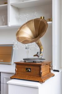 a lamp on top of a wooden box on a kitchen counter at King Bed Harbour View - Captain's Retreat in Sydney