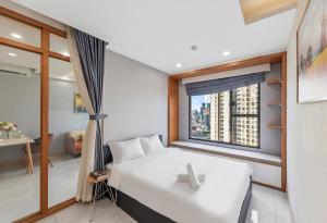 Katil atau katil-katil dalam bilik di Stay With Me Saigon Apartment - Rivergate Building +138 gambar