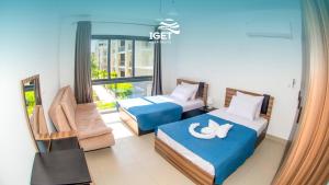 Ένα ή περισσότερα κρεβάτια σε δωμάτιο στο Canal studio in marassi marina exm19