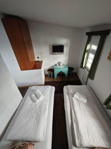 Postel nebo postele na pokoji v ubytování Guesthouse Yildiz