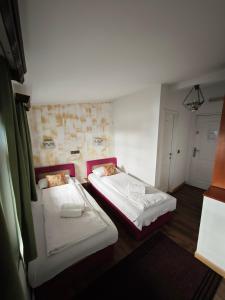 Postel nebo postele na pokoji v ubytování Guesthouse Yildiz