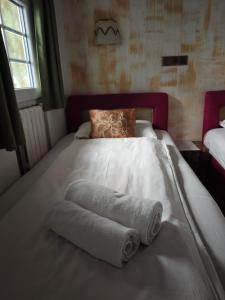 Postel nebo postele na pokoji v ubytování Guesthouse Yildiz