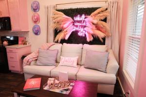 a living room with a white couch and a table at Dolly's Place 6260 in Dover
