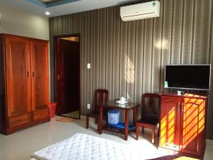 Телевизор и/или развлекательный центр в Minh Kieu 2 Hotel