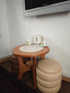 TV a/nebo společenská místnost v ubytování Guesthouse Yildiz