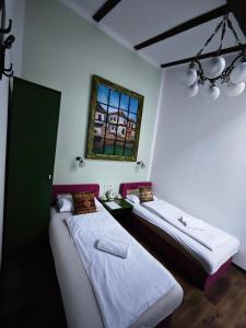 Postel nebo postele na pokoji v ubytování Guesthouse Yildiz