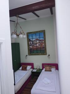 Postel nebo postele na pokoji v ubytování Guesthouse Yildiz